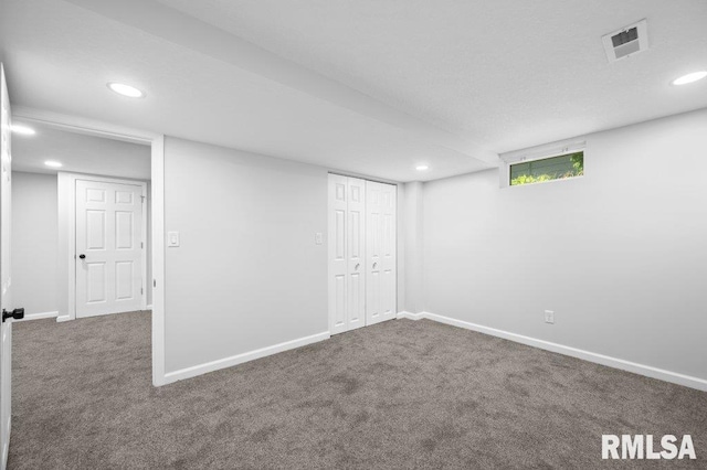 3040 Oak Street Ct, Bettendorf, IA 52722 - basement featuring carpet floors and recessed lighting