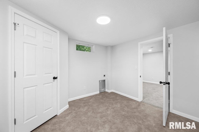 3040 Oak Street Ct, Bettendorf, IA 52722 - basement featuring carpet flooring