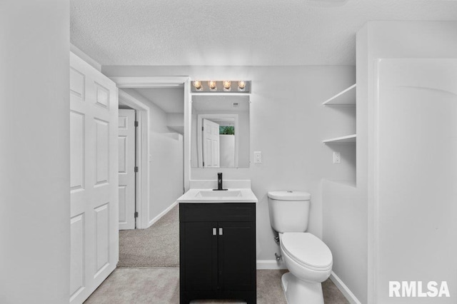 3040 Oak Street Ct, Bettendorf, IA 52722 - bathroom with vanity and a textured ceiling