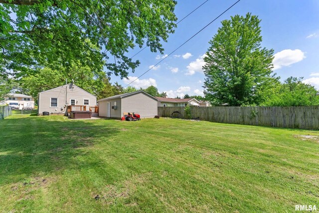 115 4th St, Colona, IL 61241 - fenced backyard with a wooden deck