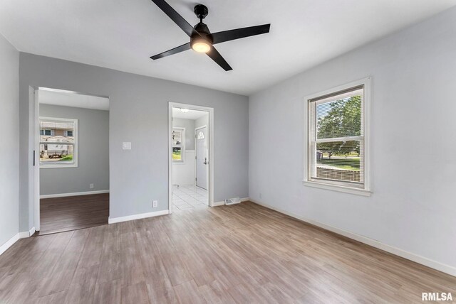 115 4th St, Colona, IL 61241 - unfurnished room featuring ceiling fan and light wood-type flooring