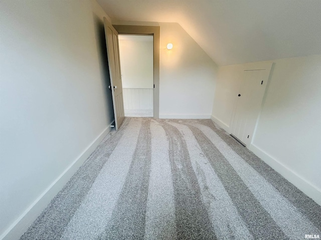 406S 3rd St, Bellevue, IA 52031 - bonus room with lofted ceiling and carpet flooring