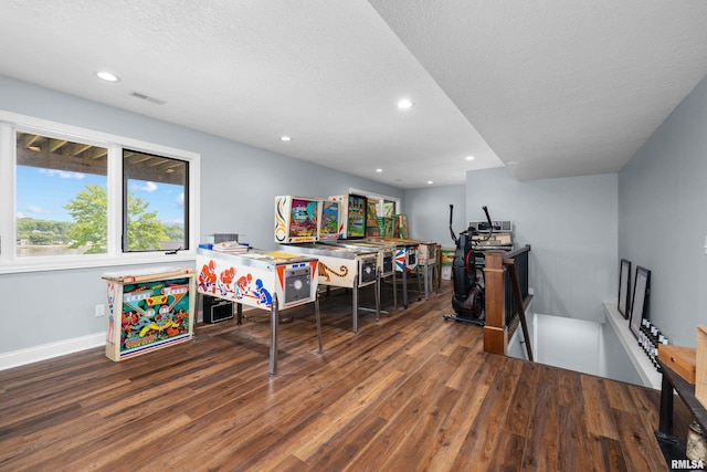 223 N 2nd St, Le Claire, IA 52753 - game room with wood finished floors, recessed lighting, and a textured ceiling