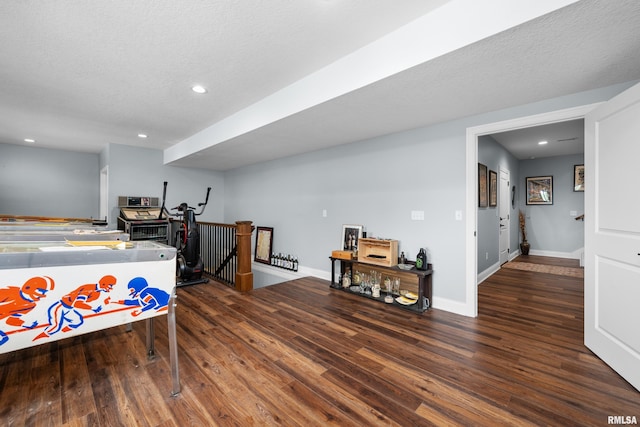 223 N 2nd St, Le Claire, IA 52753 - rec room featuring recessed lighting, wood finished floors, and a textured ceiling