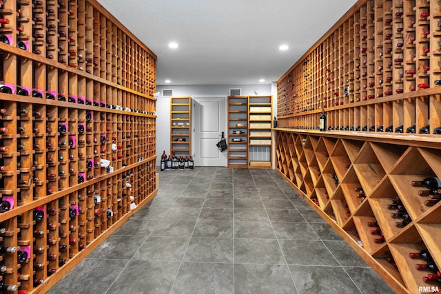 223 N 2nd St, Le Claire, IA 52753 - wine room featuring recessed lighting and dark tile patterned floors