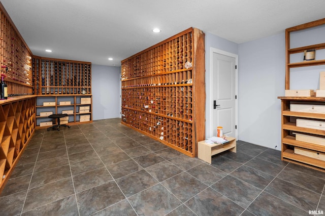 223 N 2nd St, Le Claire, IA 52753 - wine room with recessed lighting and tile patterned flooring