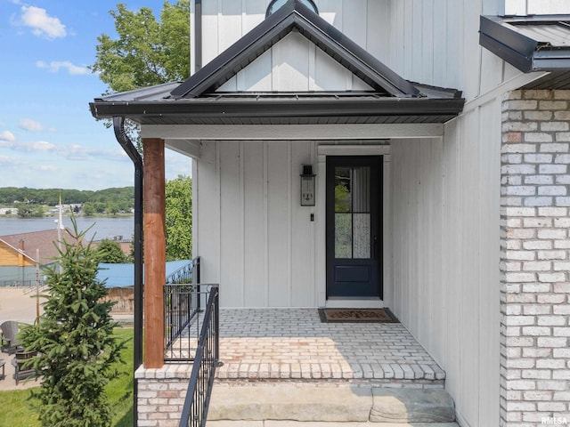 223 N 2nd St, Le Claire, IA 52753 - doorway to property with a water view