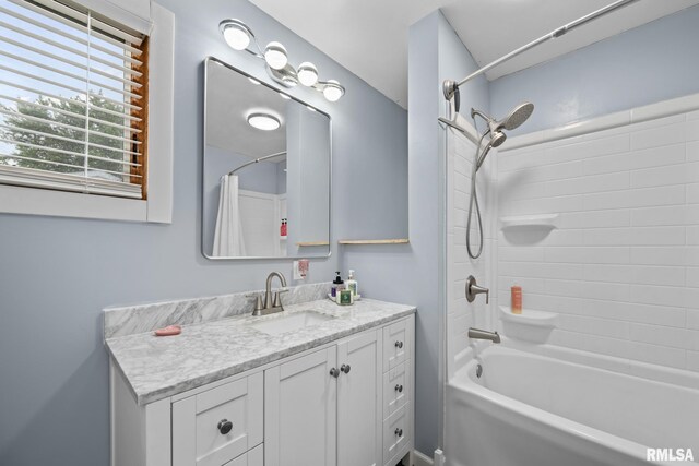 406 234th St, Aledo, IL 61231 - bathroom with vanity and shower / tub combo with curtain