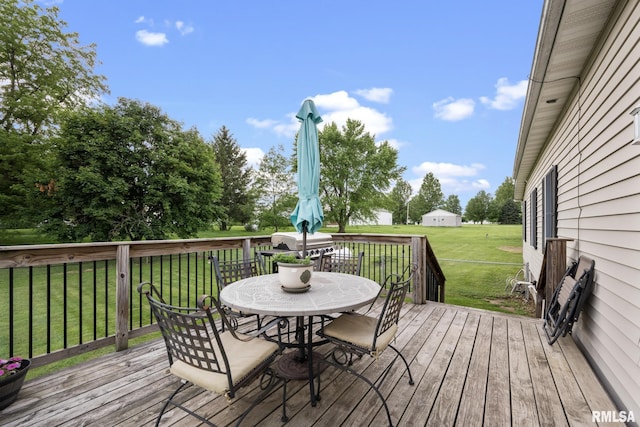 406 234th St, Aledo, IL 61231 - deck featuring outdoor dining space and a yard