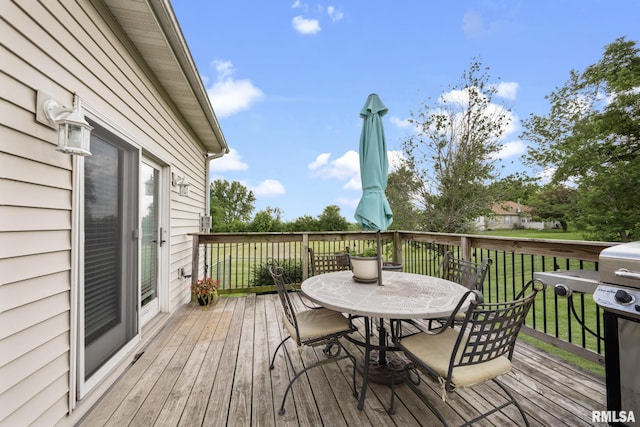 406 234th St, Aledo, IL 61231 - deck featuring outdoor dining space