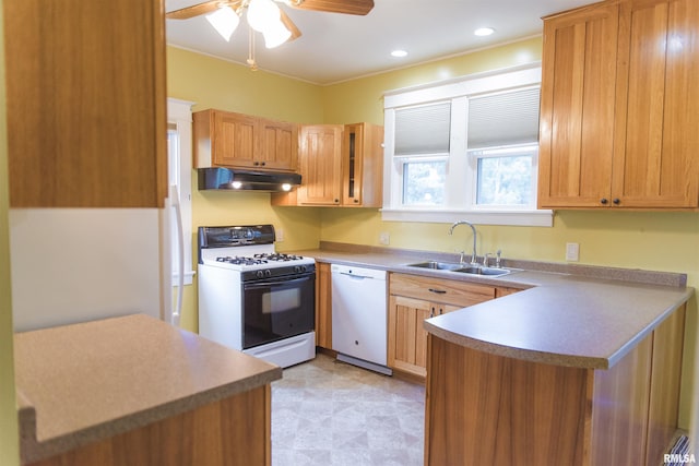 3321 State St, Quincy, IL 62301 - kitchen with white appliances, under cabinet range hood, a ceiling fan, a peninsula, and light flooring