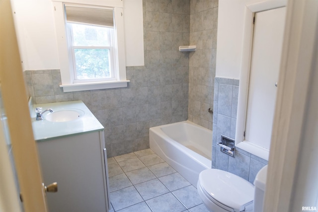 3321 State St, Quincy, IL 62301 - full bath featuring tile walls, a bath, tile patterned flooring, vanity, and a wainscoted wall