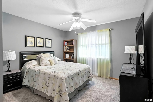 109 E Price St Unit 203, Eldridge, IA 52748 - bedroom with light carpet and ceiling fan