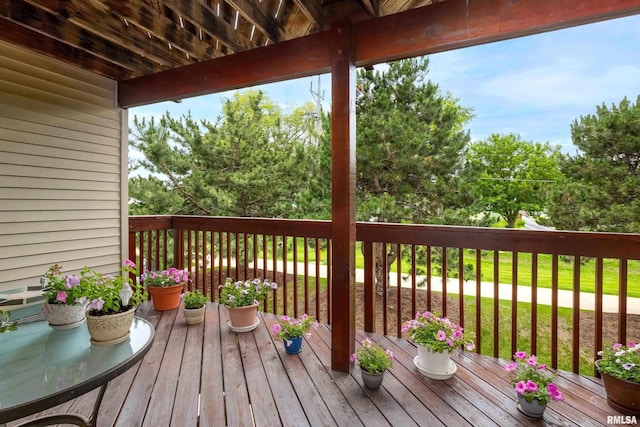 109 E Price St Unit 203, Eldridge, IA 52748 - wooden deck featuring view of wooded area