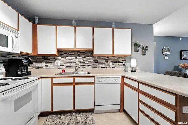 109 E Price St Unit 203, Eldridge, IA 52748 - kitchen with white appliances, tasteful backsplash, light countertops, white cabinets, and light tile patterned floors