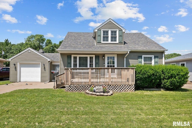 2207 4th St Unit A, East Moline, IL 61244 - view of front of home featuring a front yard, concrete driveway, a garage, and a shingled roof