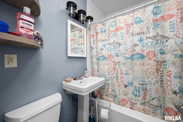 2207 4th St Unit A, East Moline, IL 61244 - bathroom featuring toilet and shower / tub combo
