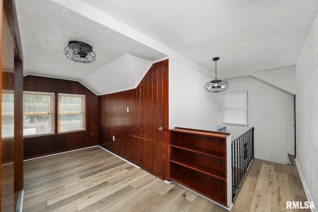 2207 4th St Unit A, East Moline, IL 61244 - bonus room with wood finished floors, a chandelier, lofted ceiling, and wooden walls