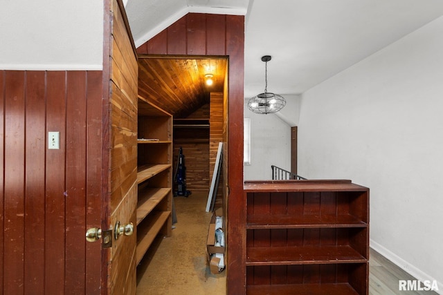 2207 4th St Unit A, East Moline, IL 61244 - stairs with lofted ceiling and wood walls