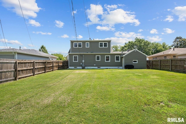 2207 4th St Unit A, East Moline, IL 61244 - back of house with a fenced backyard and crawl space
