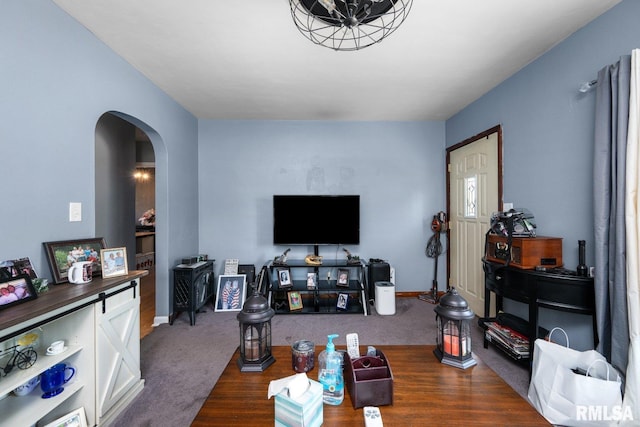 2207 4th St Unit A, East Moline, IL 61244 - living area featuring arched walkways and wood finished floors