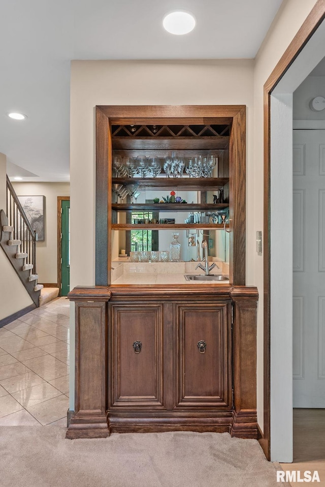 17 Wildwood Trl, Bettendorf, IA 52722 - indoor wet bar with stairs, recessed lighting, and light carpet