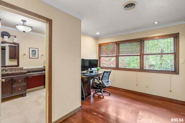 17 Wildwood Trl, Bettendorf, IA 52722 - office area with crown molding and light wood-type flooring