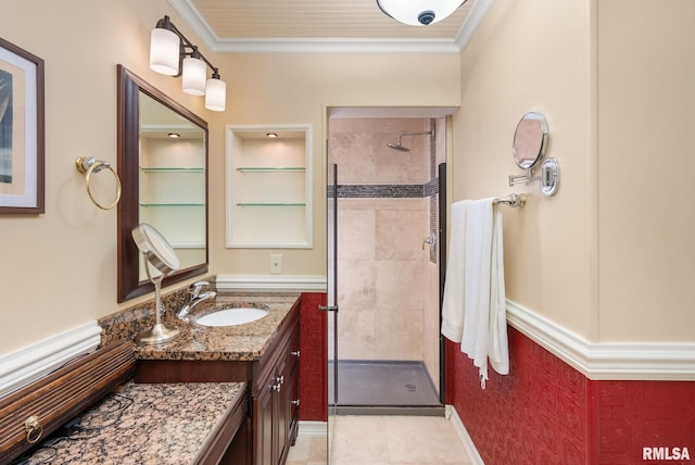 17 Wildwood Trl, Bettendorf, IA 52722 - bathroom featuring a shower stall, ornamental molding, vanity, and tile patterned floors