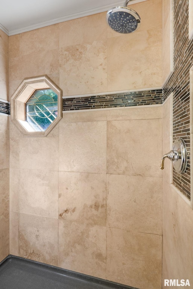 17 Wildwood Trl, Bettendorf, IA 52722 - full bathroom featuring a tile shower and ornamental molding
