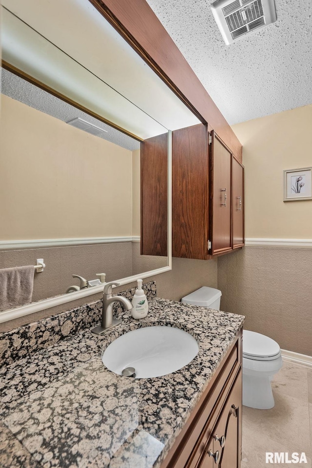 17 Wildwood Trl, Bettendorf, IA 52722 - bathroom with vanity and toilet