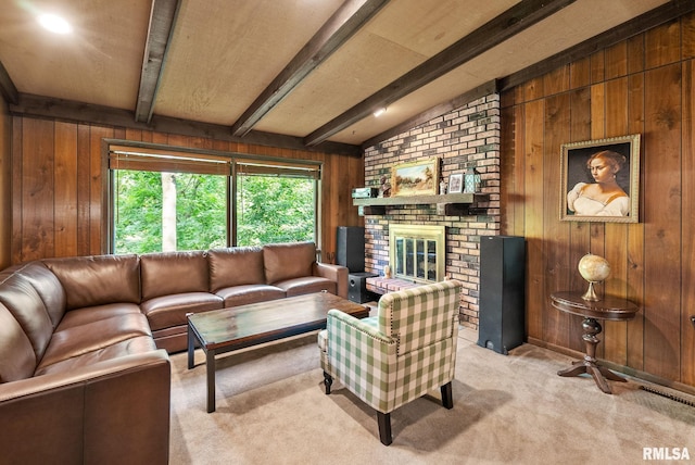 17 Wildwood Trl, Bettendorf, IA 52722 - living area featuring wooden walls, light carpet, and a fireplace