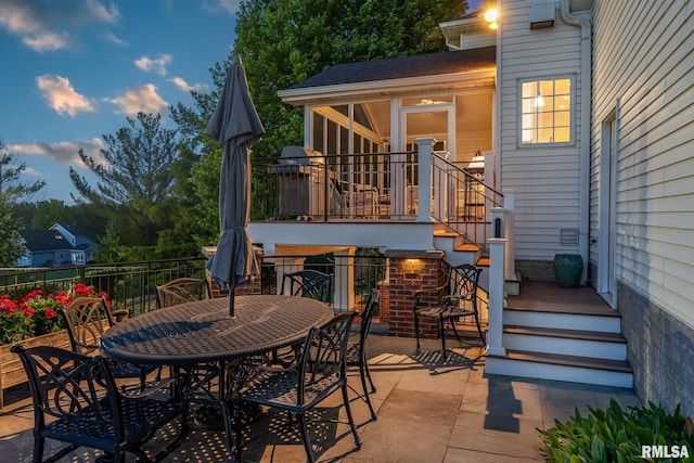 2806 E 42nd Ct, Davenport, IA 52807 - view of patio / terrace featuring outdoor dining area and stairs