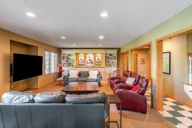 2806 E 42nd Ct, Davenport, IA 52807 - living room with a textured ceiling, recessed lighting, and carpet floors