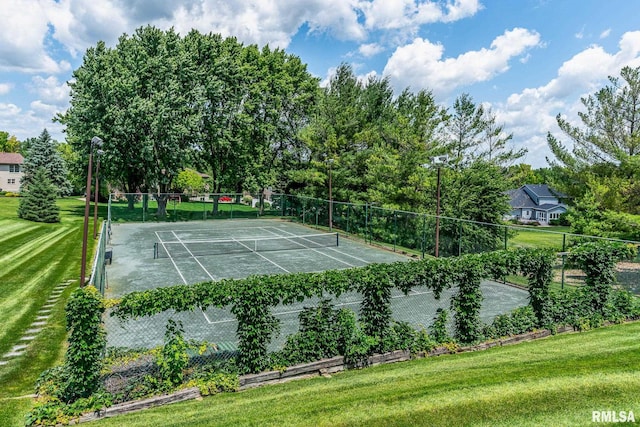 2806 E 42nd Ct, Davenport, IA 52807 - view of tennis court with view of wooded area