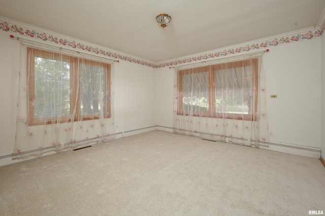 1635 Eastmere Dr, Davenport, IA 52803 - empty room with carpet flooring and crown molding