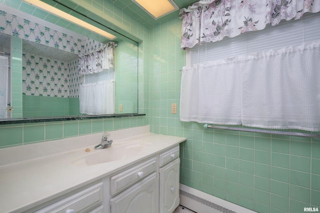 1635 Eastmere Dr, Davenport, IA 52803 - bathroom featuring tile walls and vanity