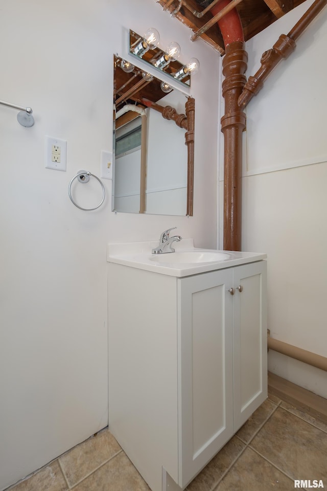 1635 Eastmere Dr, Davenport, IA 52803 - bathroom featuring tile patterned floors and vanity