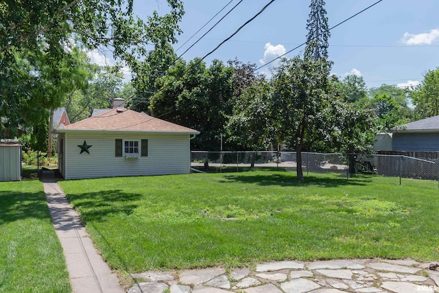 1635 Eastmere Dr, Davenport, IA 52803 - view of yard with an outbuilding
