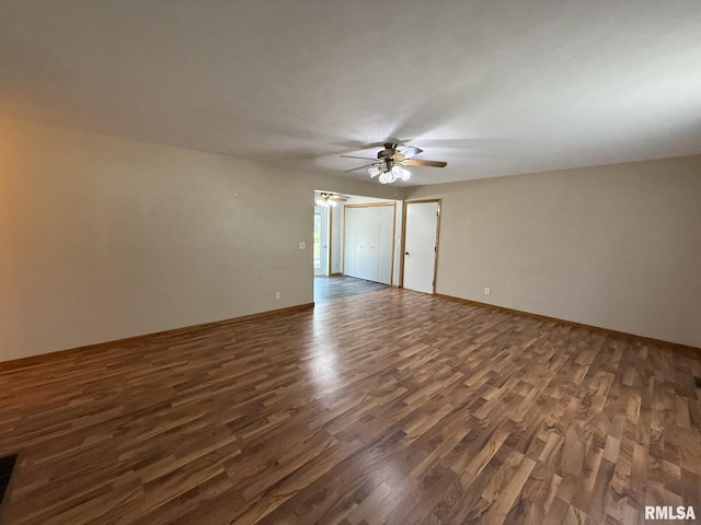 503 Lafayette St, Lafayette, IL 61449 - unfurnished room with a ceiling fan and dark wood-style flooring