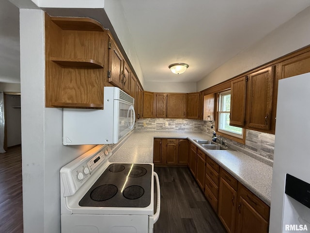 503 Lafayette St, Lafayette, IL 61449 - kitchen with white appliances, dark wood-style flooring, tasteful backsplash, and light countertops