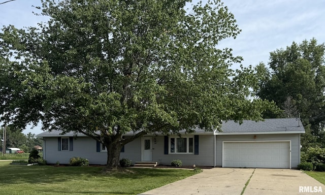 503 Lafayette St, Lafayette, IL 61449 - ranch-style house featuring an attached garage, concrete driveway, and a front yard