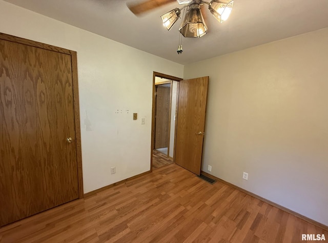 503 Lafayette St, Lafayette, IL 61449 - unfurnished bedroom featuring light wood-type flooring and baseboards