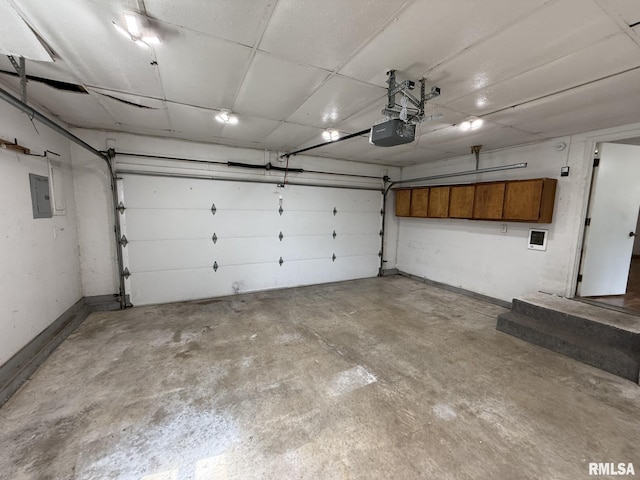 503 Lafayette St, Lafayette, IL 61449 - garage with a garage door opener and electric panel
