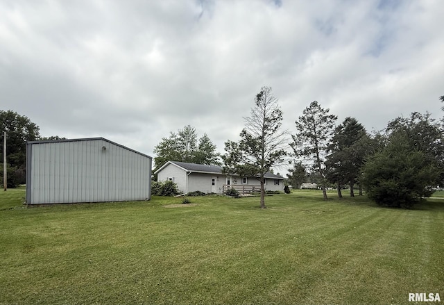 503 Lafayette St, Lafayette, IL 61449 - view of grassy yard with an outbuilding and a pole building