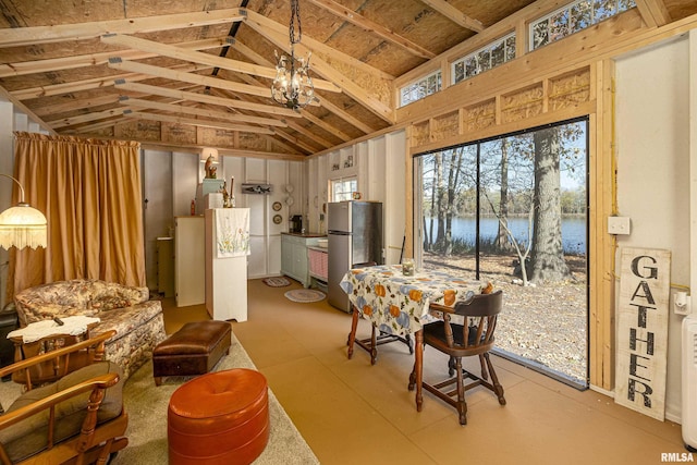 2620 S Cambon Dr, West Frankfort, IL 62896 - dining room featuring vaulted ceiling, a water view, and a chandelier