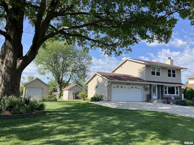 420 E Garfield St, Kewanee, IL 61443 - view of front of property featuring a chimney and a front lawn
