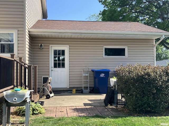 420 E Garfield St, Kewanee, IL 61443 - back of house featuring roof with shingles and a patio