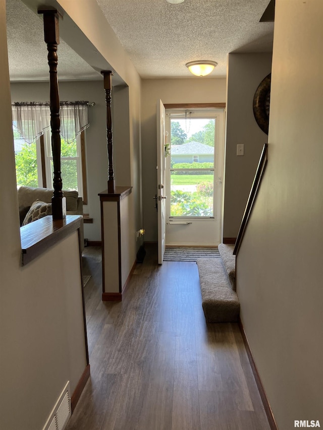 420 E Garfield St, Kewanee, IL 61443 - entrance foyer with a textured ceiling and wood finished floors
