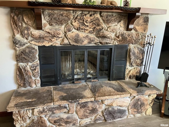 420 E Garfield St, Kewanee, IL 61443 - detailed view of wood finished floors and a fireplace