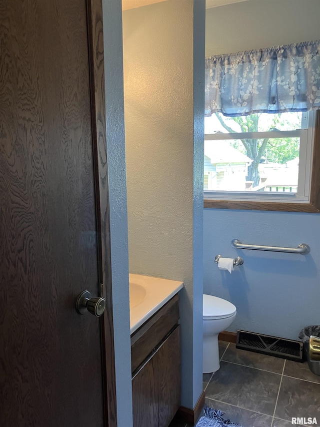 420 E Garfield St, Kewanee, IL 61443 - bathroom featuring vanity and tile patterned flooring